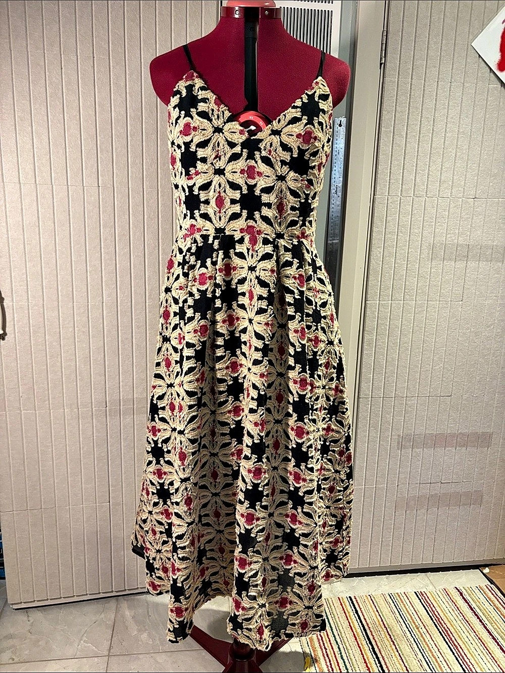 H&M Jacquard-Weave Midi Dress featuring a black, cream, and pink floral tapestry